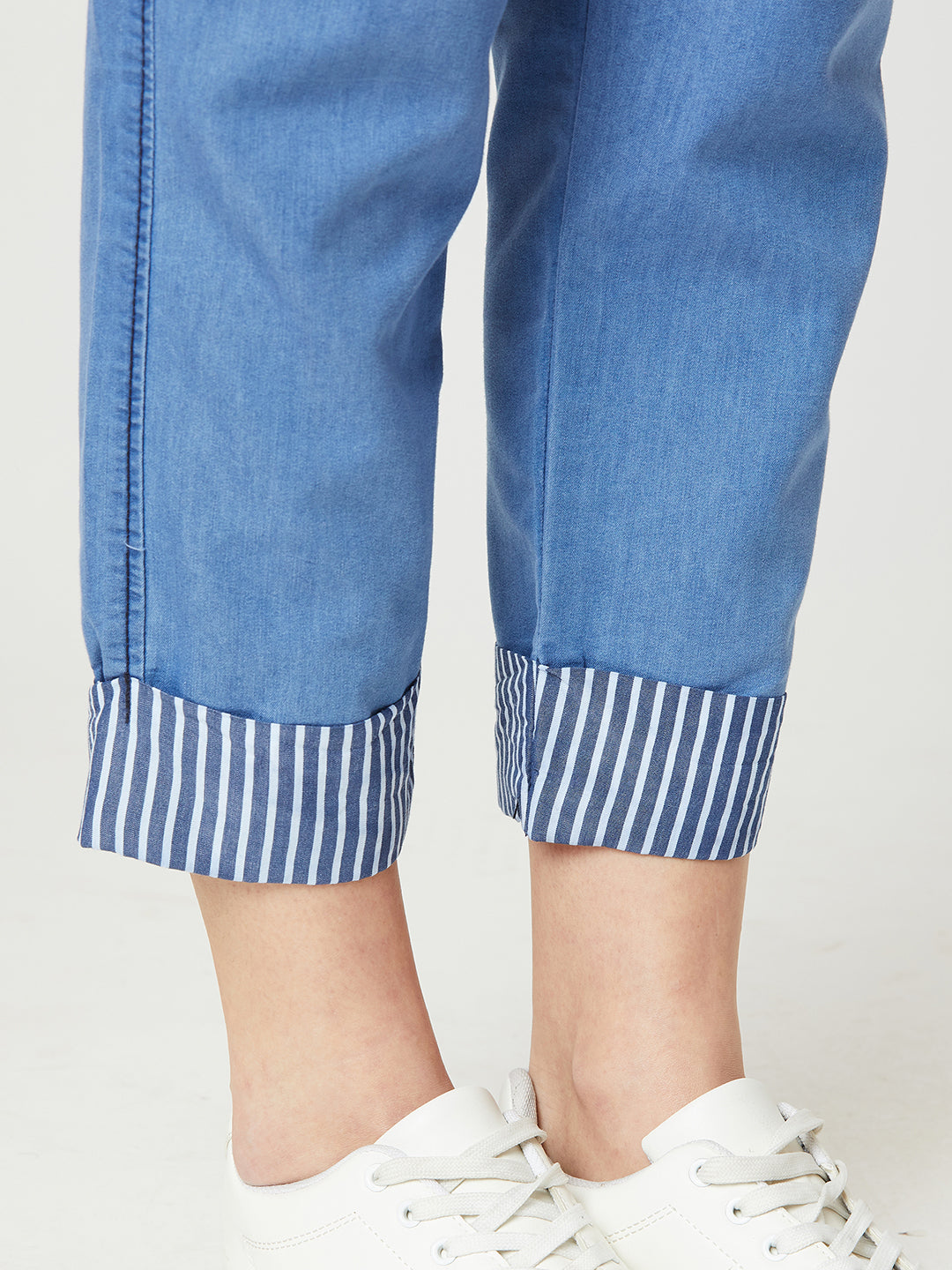 Women's Blue High Rise Clean Look Solid Cropped Striped Detailing Denim Joggers