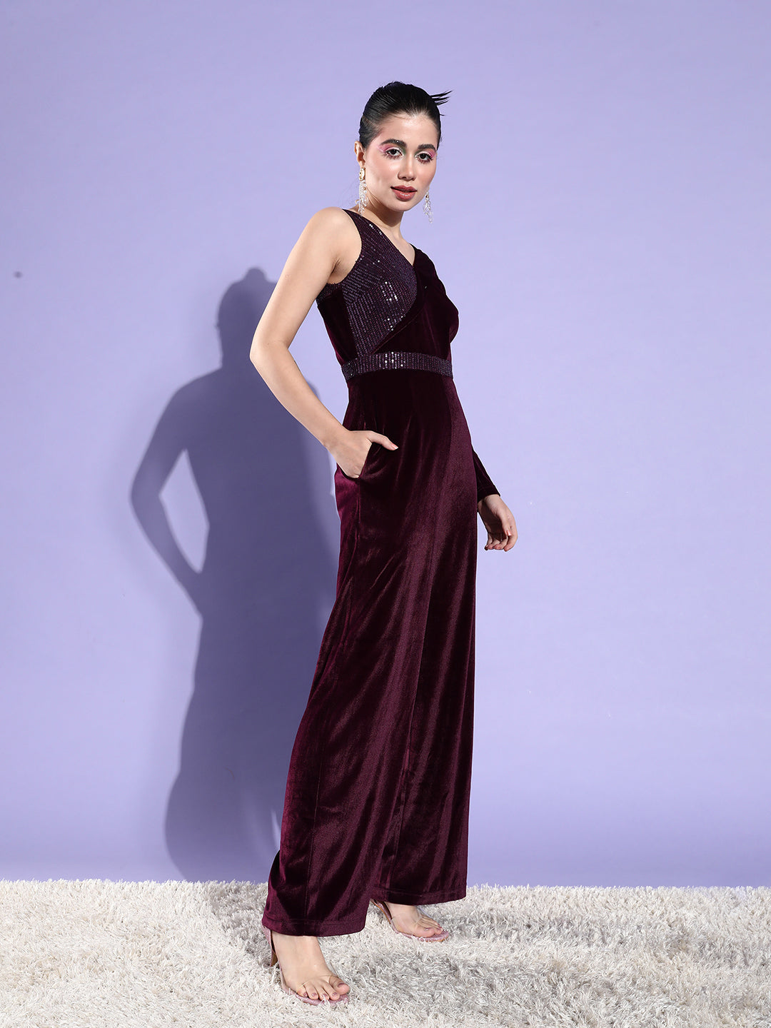 Crease Ease Women's Dark Purple V-Neck Full Sleeve Solid Asymmetric Regular-Length Velvet Jumpsuit